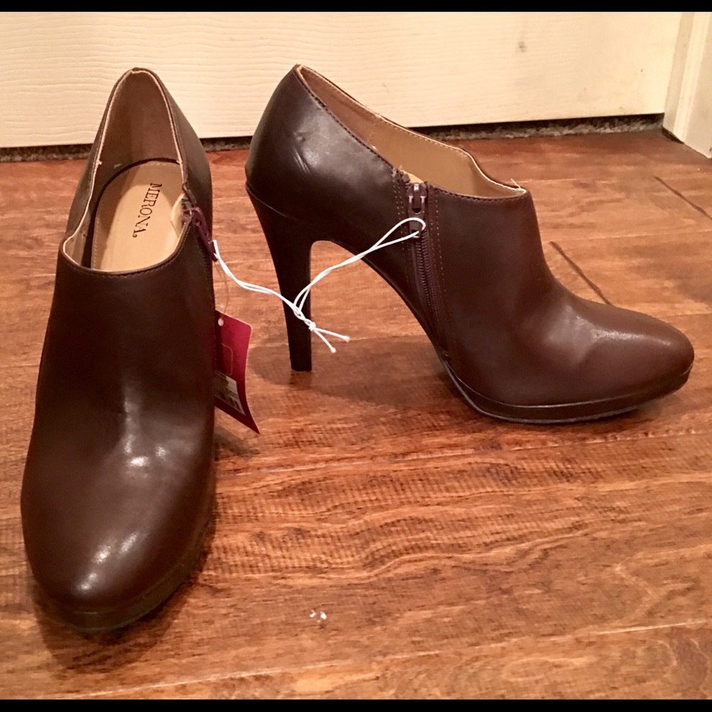 High heel booties.  Brand new.